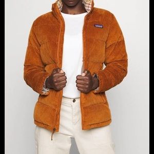 Patagonia Down Jacket! Worn once in great condition! Brown with plaid inside.